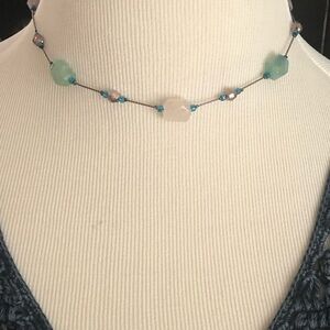 Pretty multi colored bead necklace.